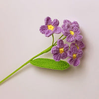 Handwoven forget-me-not flowers