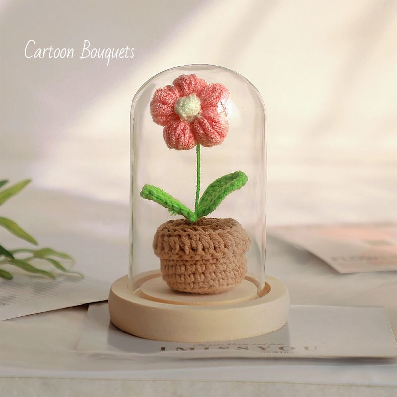 knitted potted plant with glass cover